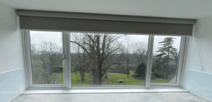 Roller blind at a kitchen unit